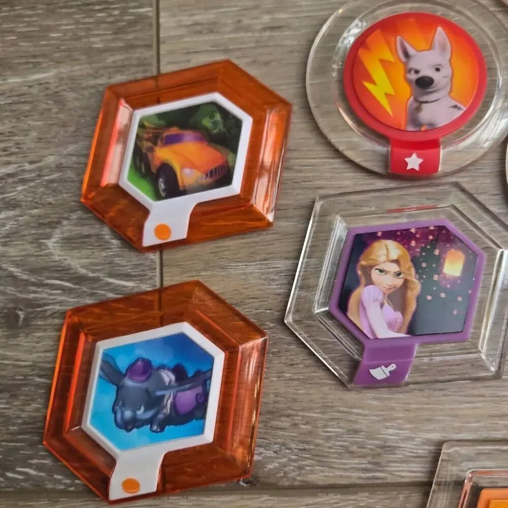 Disney Infinity power disc's lot of 11 Mulan, mickey, rapunzel, Alice, Nemo, car